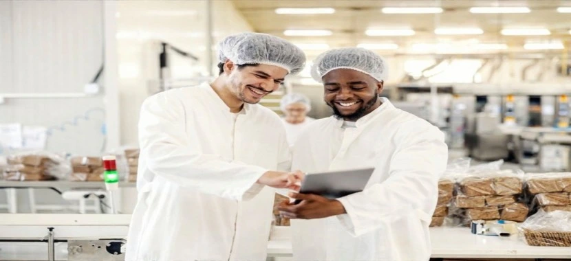 Food safety team conducting HACCP certification process in a Dubai food manufacturing facility.