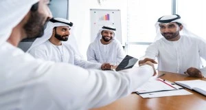 UAE business professionals meeting to review supplier approval and tender compliance requirements